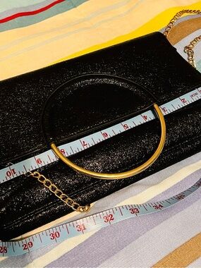 Black Shoulder Bag with Gold Ring Accent